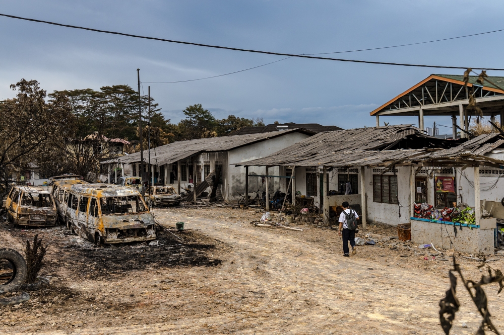 The aftermath general view of Kampung Kuala Sungai Baru were affected by the gas pipeline fire in Putra Heights, Puchong on April 3, 2025. — Picture by Firdaus Latif