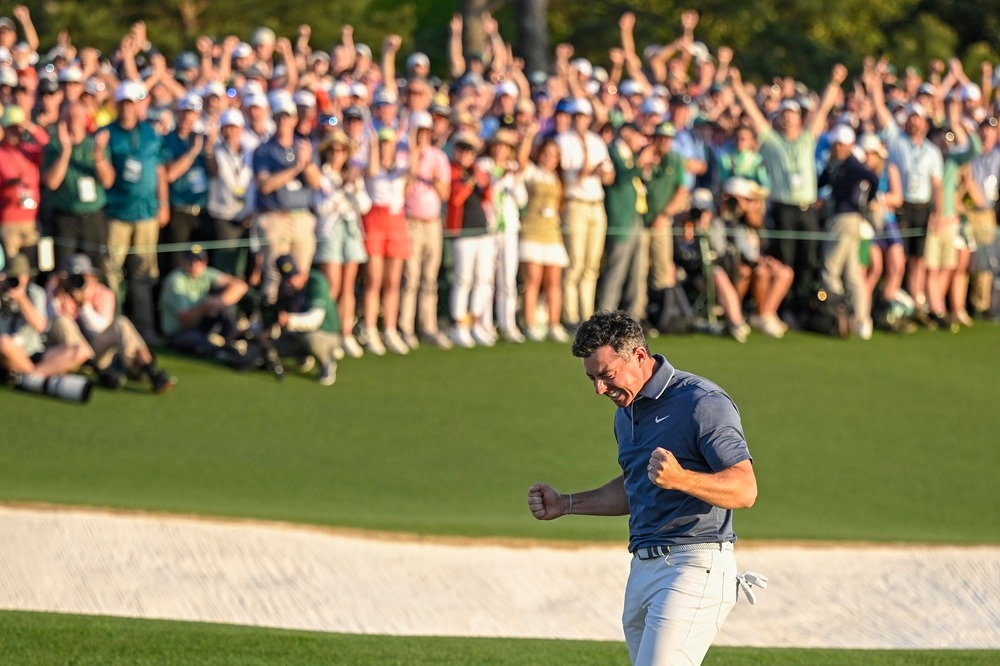 Rory McIlroy rewrote golf’s history books by becoming only the sixth player to complete the career Grand Slam following an emotional victory at the Masters Tournament. — Getty Images pic