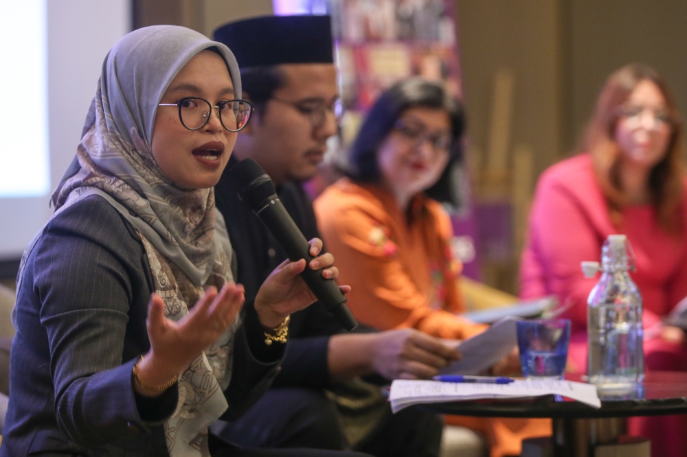 Syarie lawyer Nor Liana Ali (left) speaks at the “Highlights of Issues Throughout” forum at the Holiday Inn Bangsar in Kuala Lumpur on September 9, 2025. — Picture by Yusof Isa