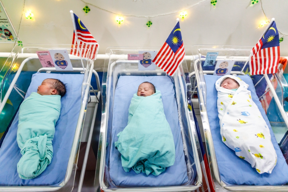 The NRD had typically issued new birth certificates which states a Malaysia-born child is not a Malaysian or has undetermined status, after finding out that the child’s biological parents are unknown.— File photo of Merdeka babies by Firdaus Latif for illustration purposes only