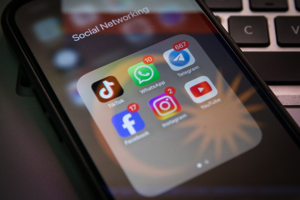 Social media platforms operating in Malaysia are now required to implement stronger safeguards against harmful content, improve reporting systems and verify certain advertisers under the new Risk Mitigation Code. — Picture by Yusof Isa