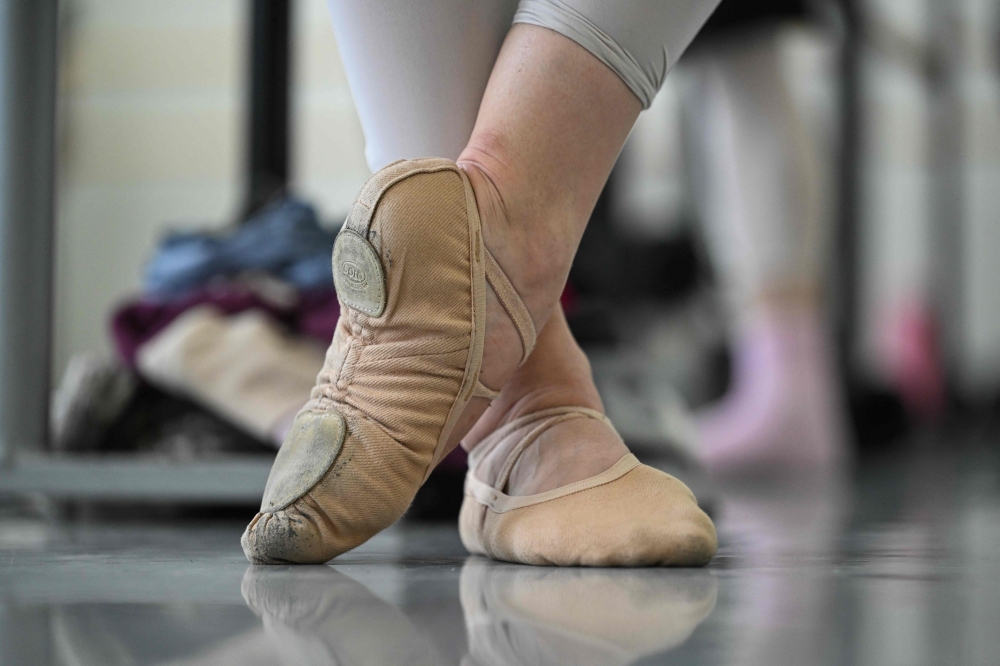 A dancer wearing a pair of pointe shoes attends a ballet lesson at the Nizhny Novgorod Opera and Ballet Theatre in Nizhny Novgorod on May 17, 2026. — AFP pic