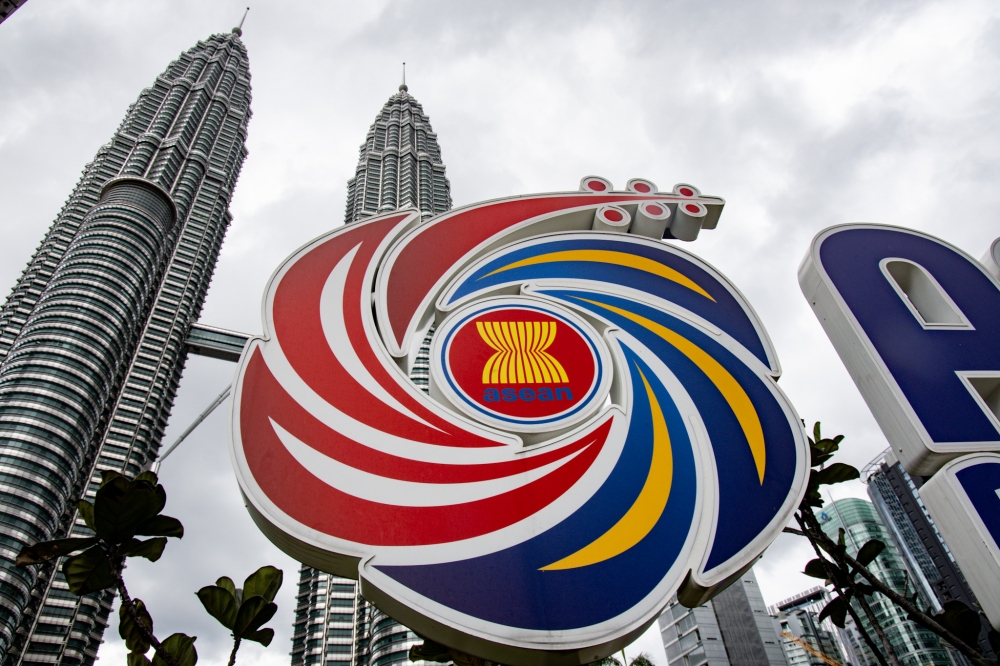 The Association of Southeast Asian Nations (Asean) logo stands in front of the Petronas Twin Towers in Kuala Lumpur ahead of the 47th Asean Summit on October 24, 2025. — Firdaus Latif pic