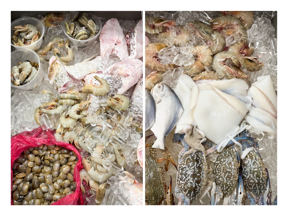 Select from a vast choice of seafood at the stall with ‘remis’ clams, prawns, grouper fish (left) and flower crabs, ‘sotong’ and pomfret fish (right). — Pictures by Lee Khang Yi