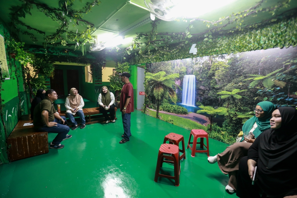 Residents gather at a refurbished lift lobby in Block C of PPR Kg Baru Hicom on June 15, 2026. — Picture by Sayuti Zainudin