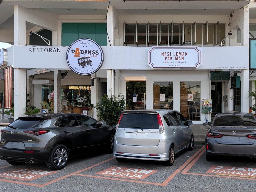 The two shop lots that used to house Padangs on Wheels are now home to both concepts. — Picture by Ethan Lau