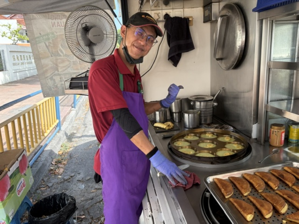 Alan Uan hopes to start his Apong Guan food truck business in Ampang in August. — Picture by Opalyn Mok