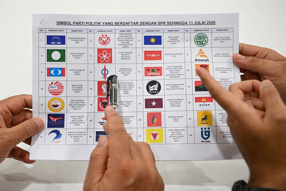 Election Commission (EC) officials inspect registered party symbols during a simulation of the Negeri Sembilan state election nomination process at the Seremban City Council (MBS) headquarters in Forest Heights, Seremban, July 17, 2026. — Bernama pic