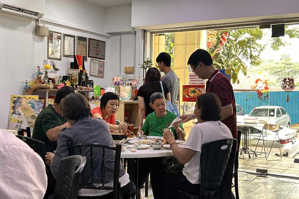 Most of the tables are taken up by families. — Picture by CK Lim