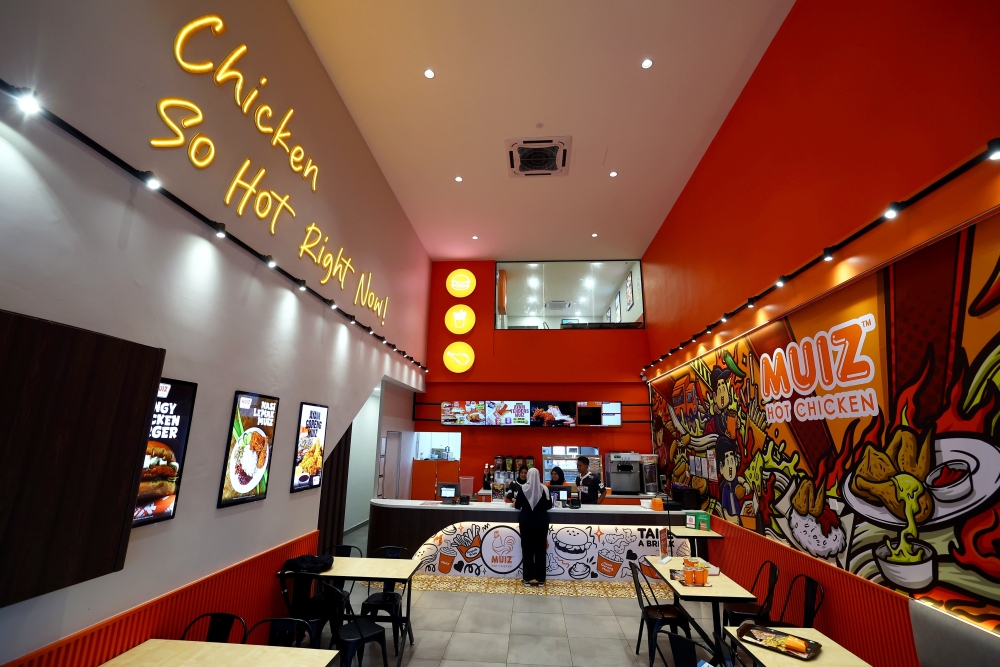 Muiz Hot Chicken restaurant has become a popular destination for customers. — Bernama pic 