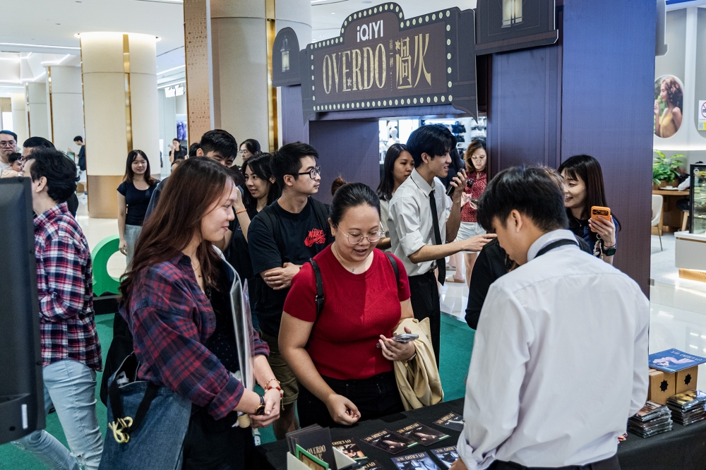 Fans queue and explore the ‘Overdo’ pop-up at Sunway Pyramid’s Lower Ground 1. — Picture by Firdaus Latiff