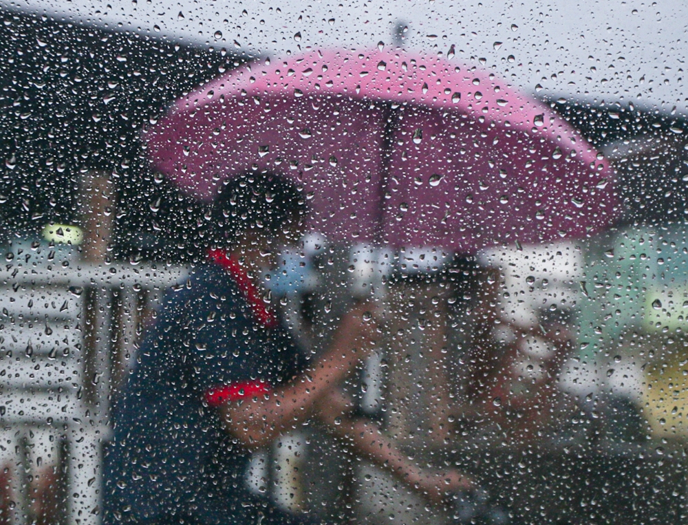 Thunderstorm warnings are often issued shortly beforehand because storms can form within one to two hours and affect only small areas. — Picture by Farhan Najib
