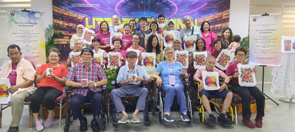 Project participants, family members and organisers gather at the launch of the ‘Our Art, Our Stories’ exhibition, which celebrates the creativity and individuality of people living with Parkinson’s. — Picture courtesy of Universiti Malaya