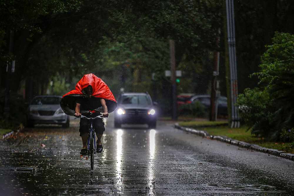 A man rides a bike as Hurricane Zeta approaches New Orleans, Louisiana October 28, 2020. u00e2u20acu201d Reuters pic
