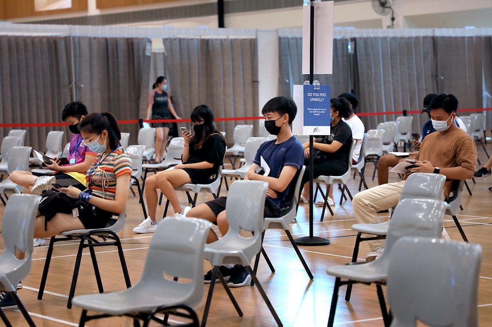 Students being monitored after getting their injections at a vaccination centre in ITE College Central on June 7, 2021.u00e2u20acu201d TODAY pic