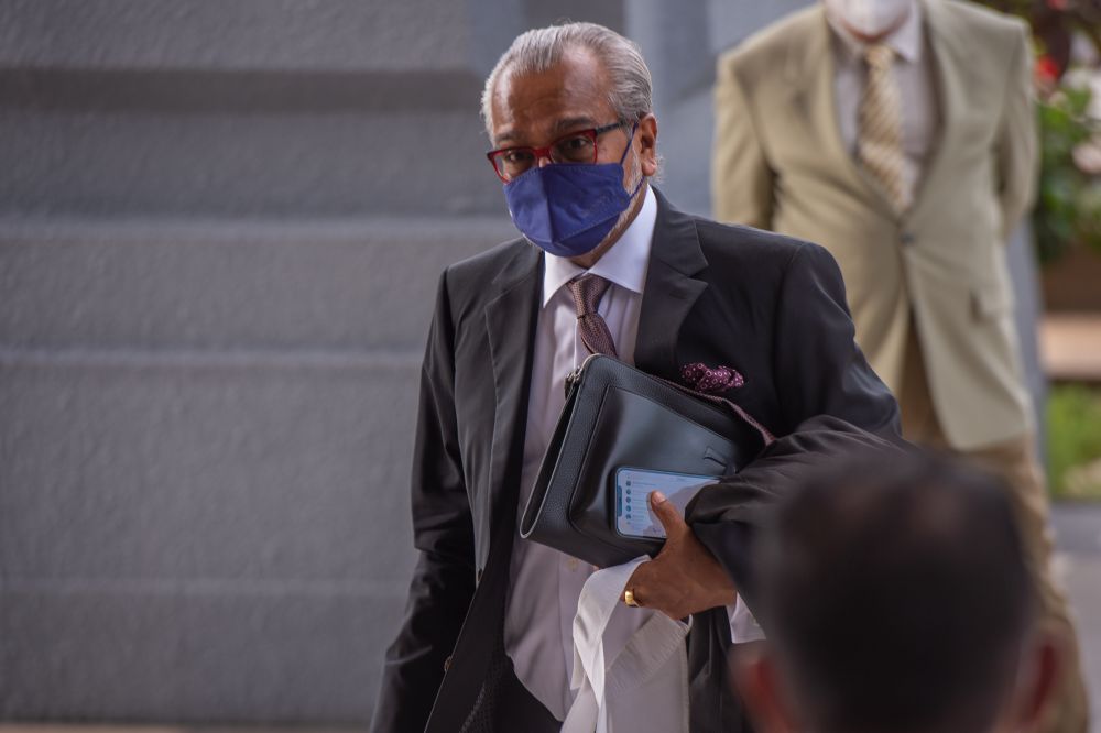 Lawyer Tan Sri Muhammad Shafee Abdullah arrives at the Kuala Lumpur High Court March 21, 2022. u00e2u20acu201d Picture by Shafwan Zaidon