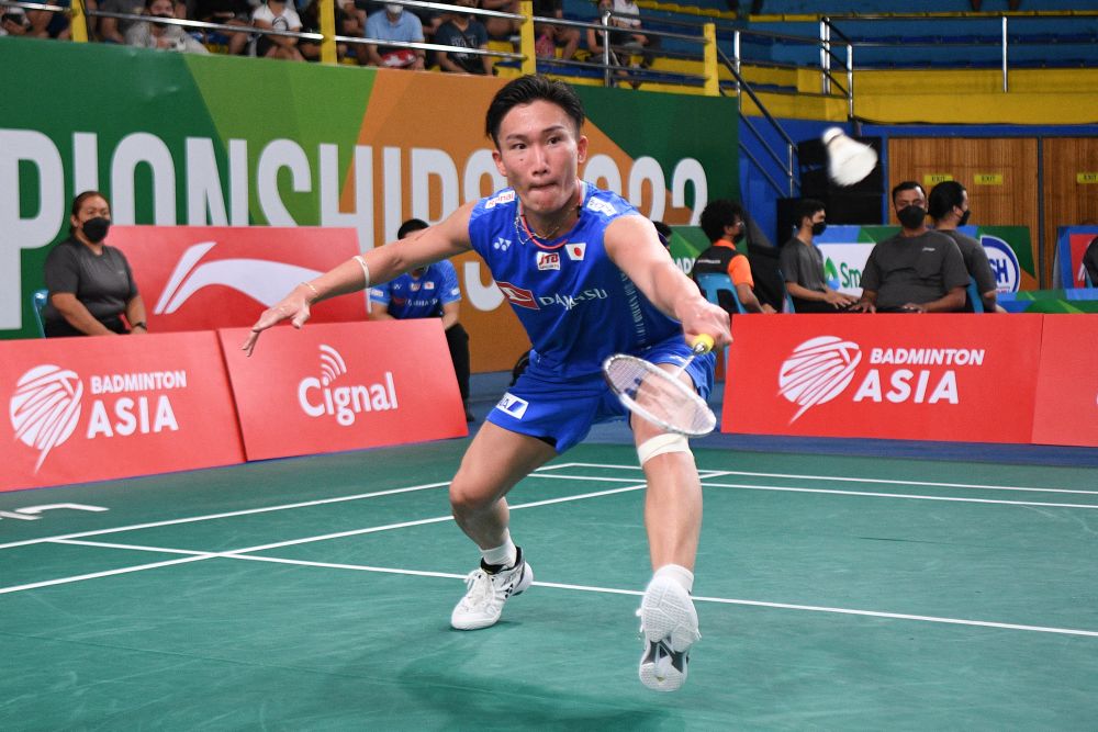Japan's Kento Momota hits a return against Indonesia's Chico Dwi Wardoyo at the Badminton Asia Championships in Muntinlupa, Manila April 27, 2022. u00e2u20acu201d AFP pic