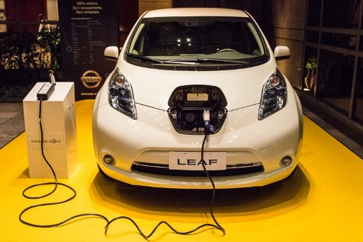 Nissanu00e2u20acu2122s Leaf, an all electric car, displayed at the entrance of the site for the Womenu00e2u20acu2122s Forum Brazil 2012 in Sao Paulo, Brazil on June 4, 2012. u00e2u20acu201d AFP file pic