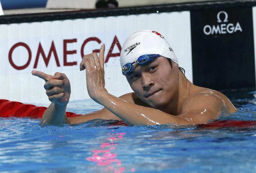 Sun Yang of China reacts after competing in the men's 800m freestyle heats during the World Swimming Championships at the Sant Jordi arena in Barcelona July 30, 2013